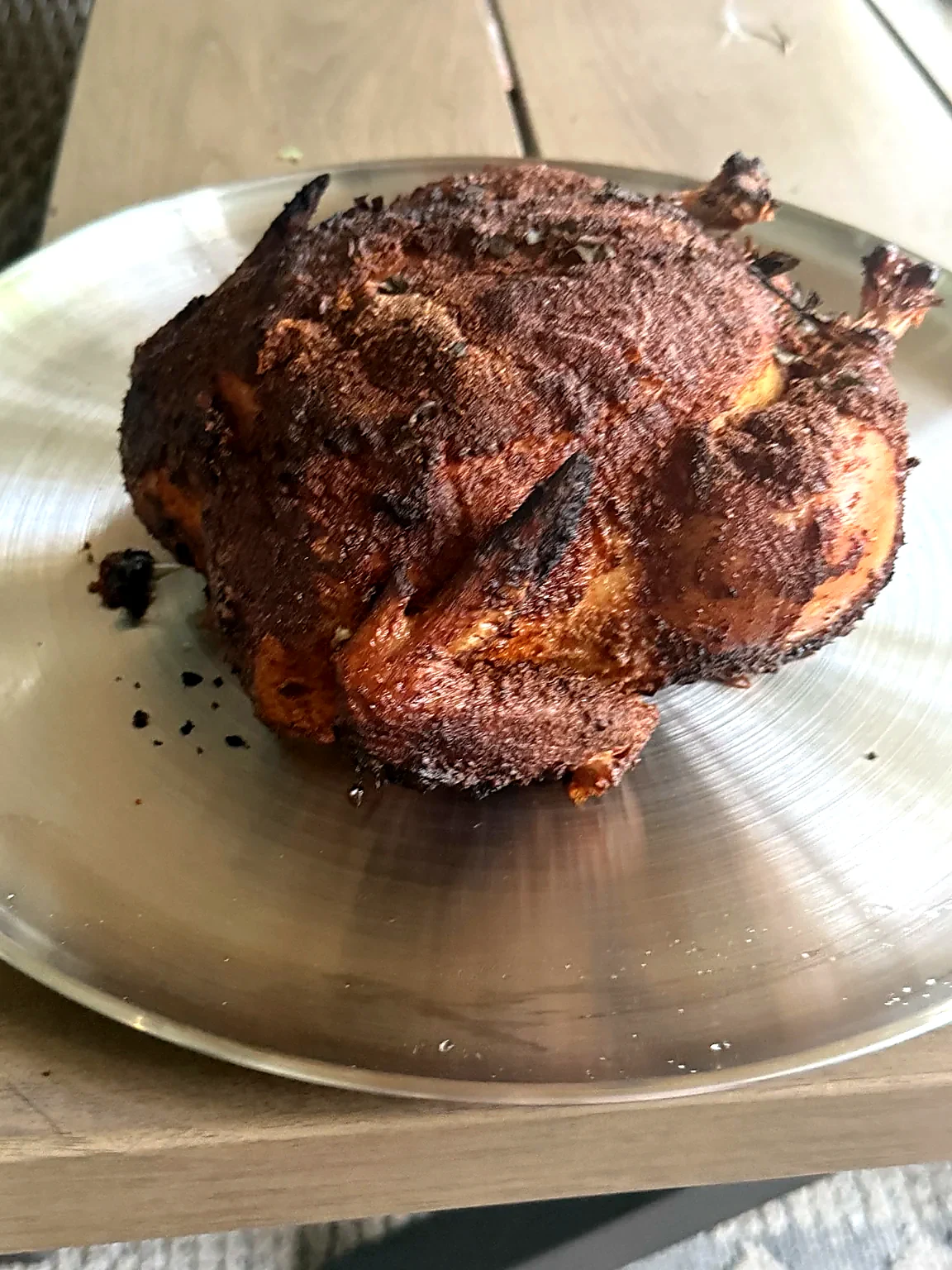 The finished bird — deep color on the skin, ready to rest and carve.